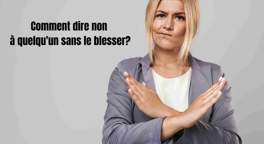 Une femme fait un signe de refus avec ses bras croisés, illustrant comment dire non poliment.